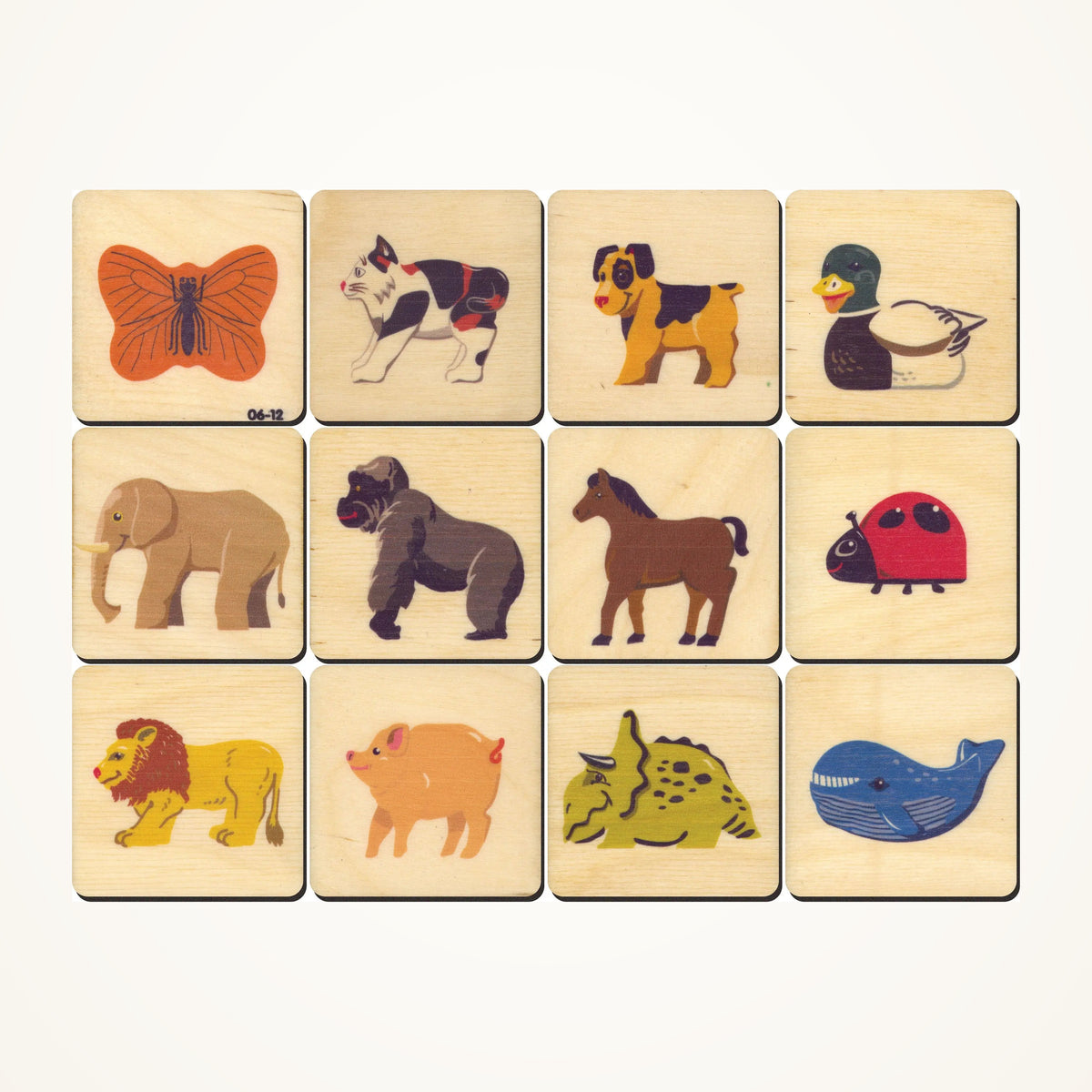 Maple Landmark Animals Memory Tiles photographed on a warm ivory background.