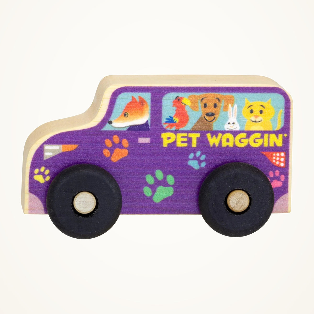 Maple Landmark Pet Waggin' Scoot Wooden Toy Vehicle photographed on a warm ivory background.