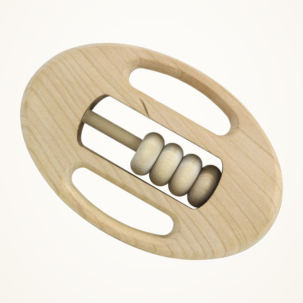 Maple Landmark Spinning Beads Cheri Wooden Baby Rattle on a warm ivory background