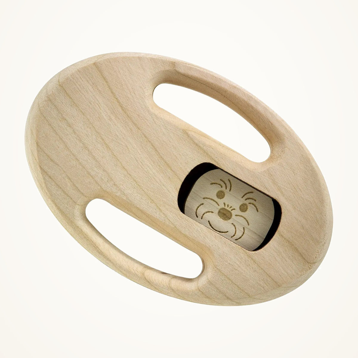 Maple Landmark Peek-A-Boo Cheri Wooden Baby Rattle photographed on a warm ivory background.