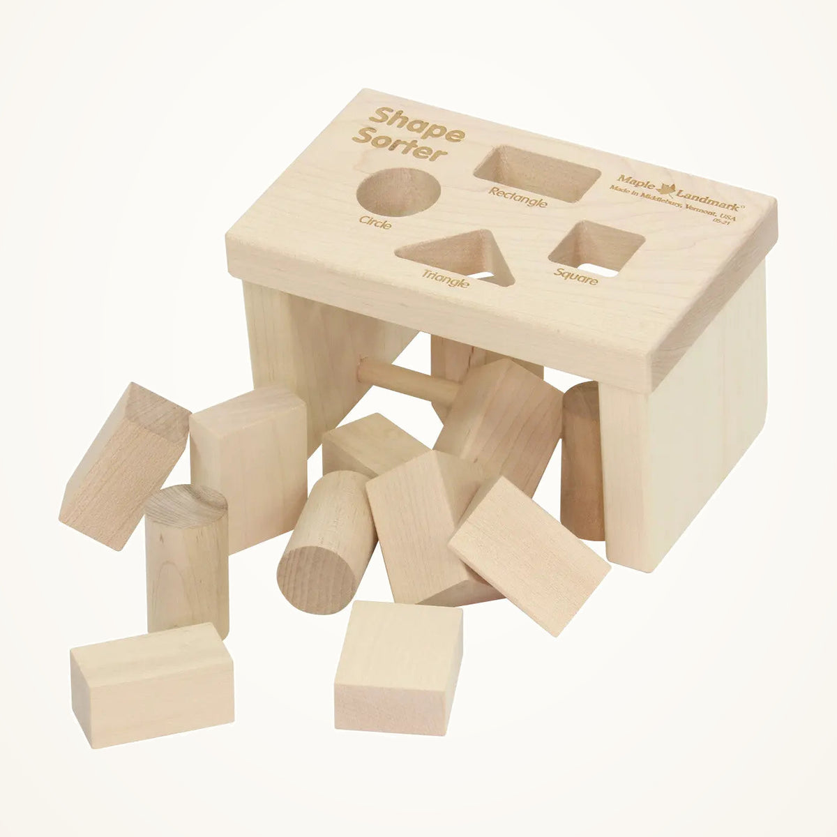 Maple Landmark Natural Wooden Shape Sorter Bench on a warm ivory background