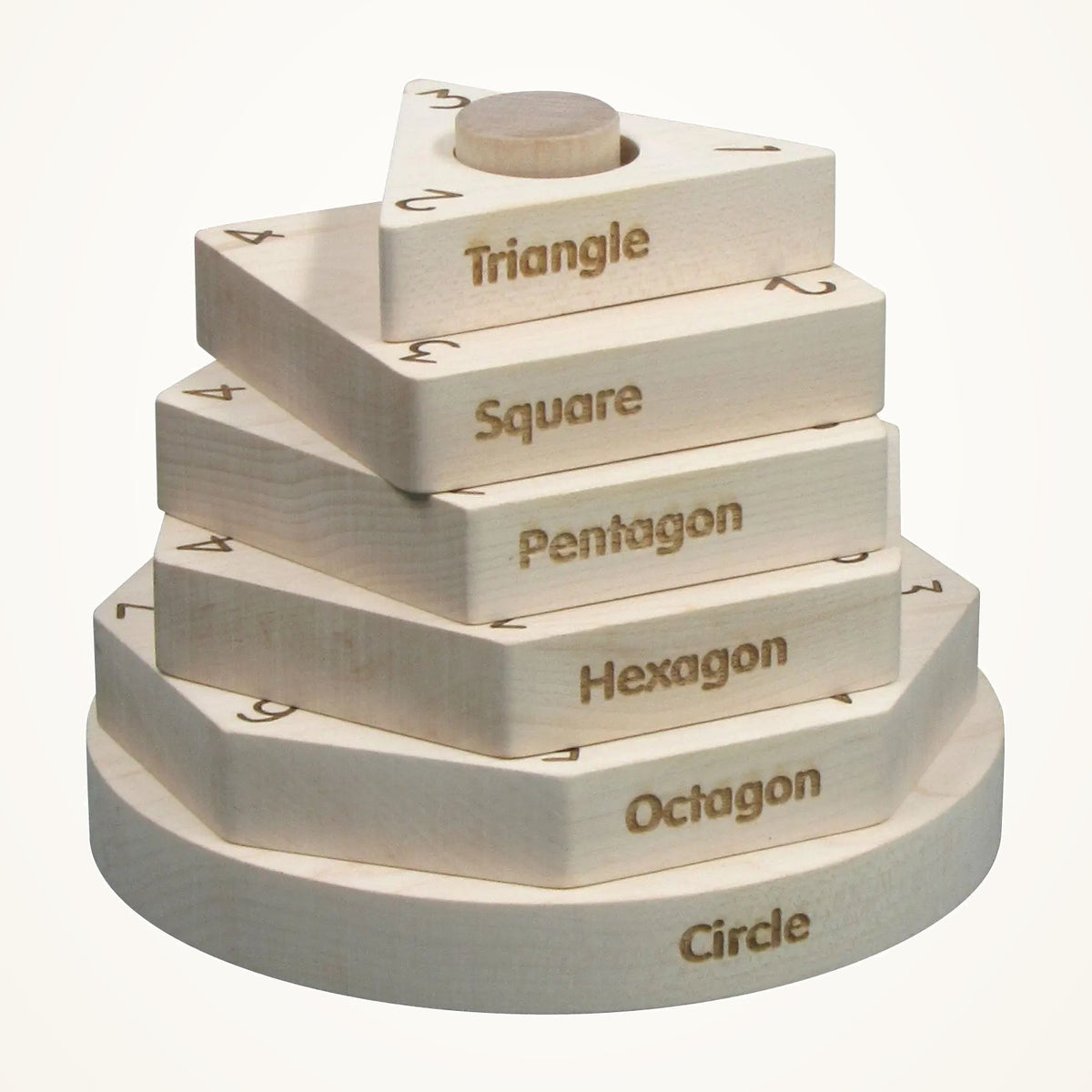 Maple Landmark Natural Wooden Shape Stacker photographed on a warm ivory background.