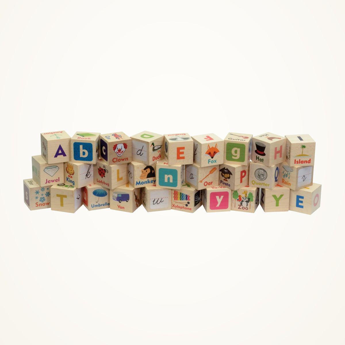 Maple Landmark Letter Picture Wooden Blocks photographed on a warm ivory background.