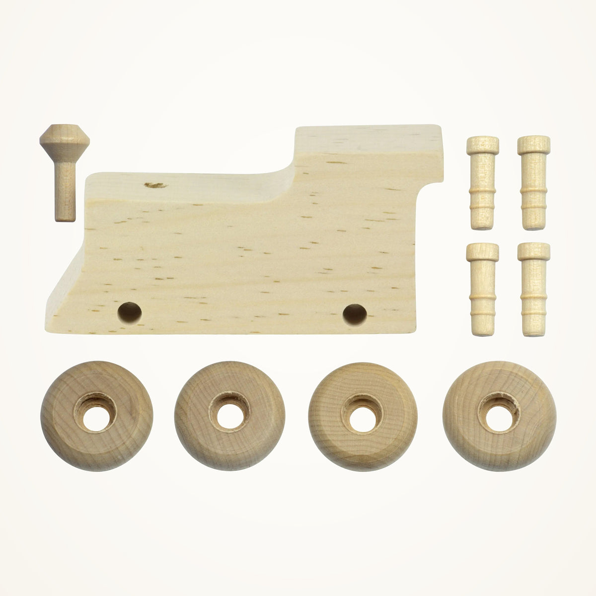 Maple Landmark Made By Me Train Engine (Set of 4) photographed on a warm ivory background.