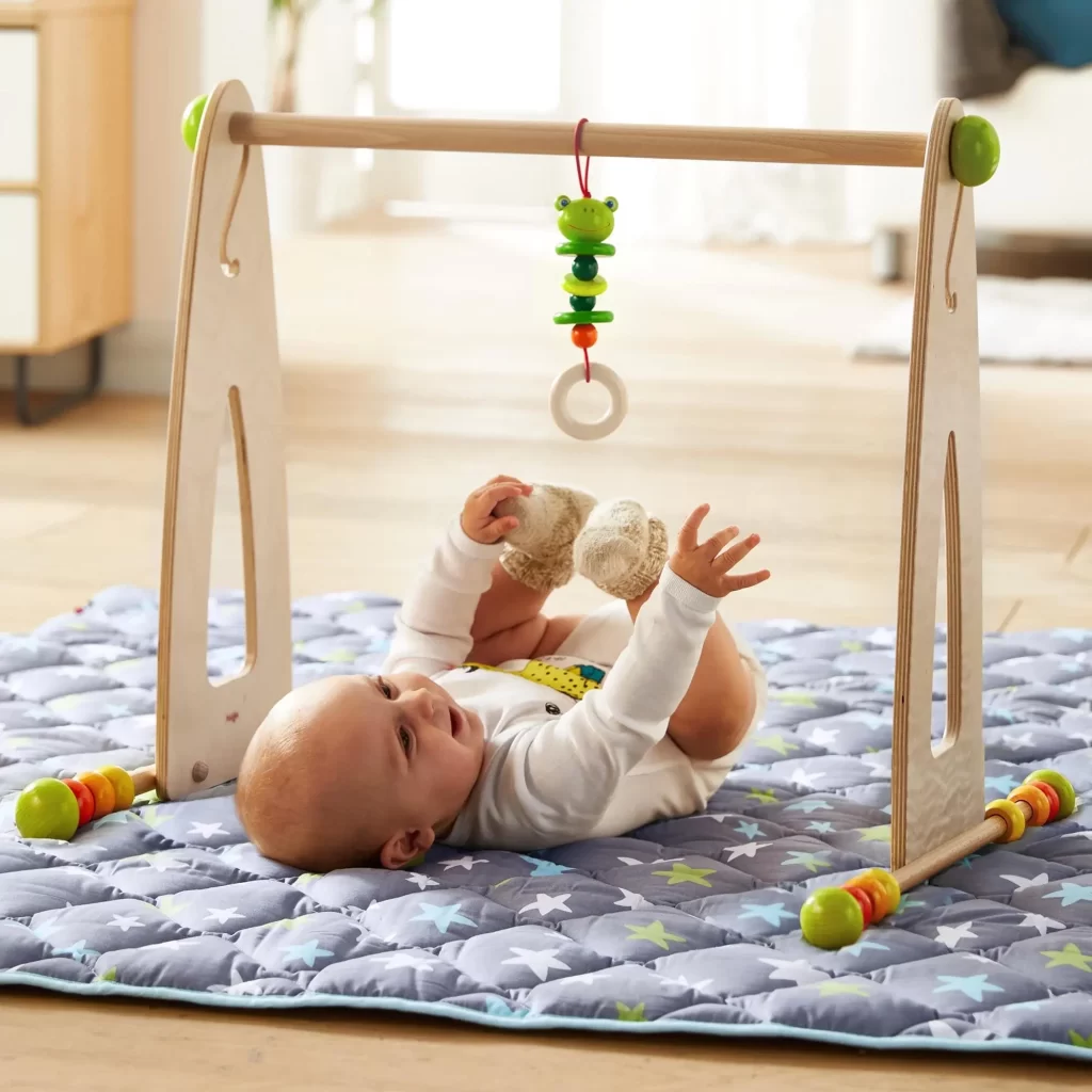 Wooden Baby Play Gym with Rattling Frog | HABA USA
