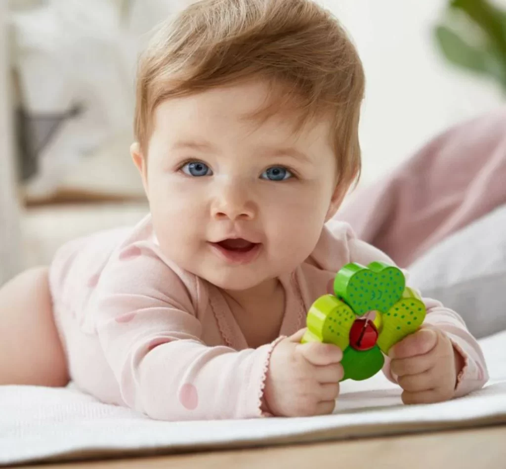 Shamrock Wooden Baby Rattle with Bell | Develop Fine Motor Skills - HABA