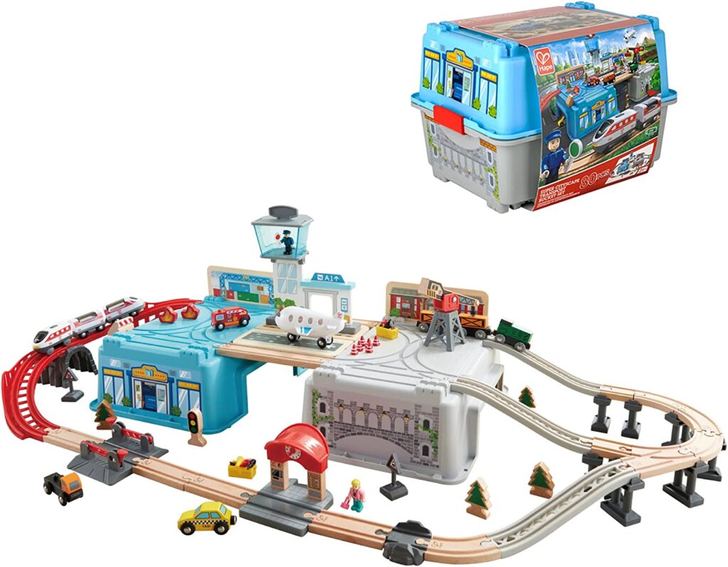 Hape Super Cityscape Transport Bucket Set | Wooden Toy Train Set with City Scenes, Plane, Battery-Powered Engine, for Children 3+ Years